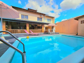 Casa com PISCINA próximo ATRATIVOS/ wifi/ garagem